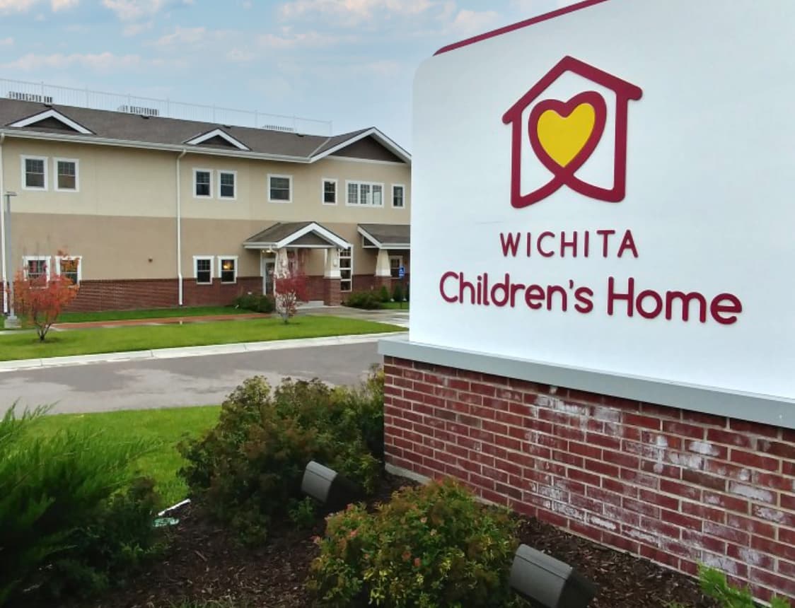 Sign in front of the Wichita Children's Home building