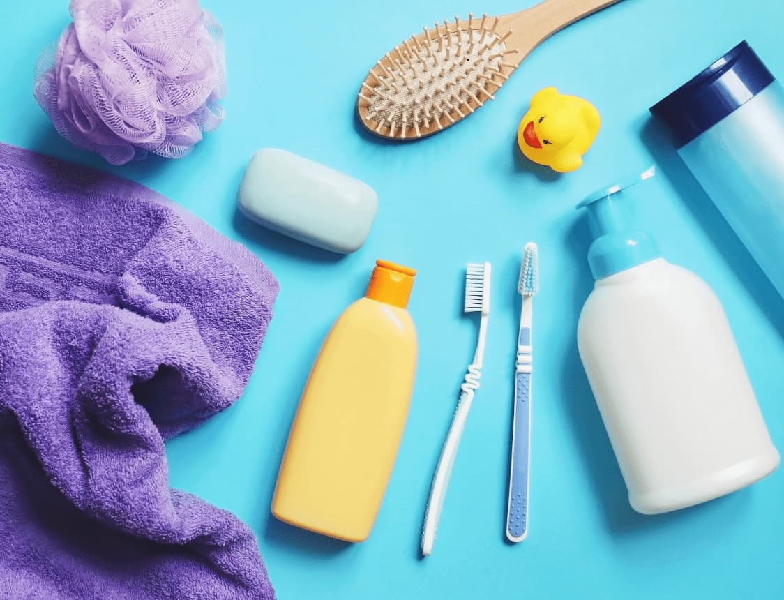 A variety of hygiene items including soap, toothbrushes, and more